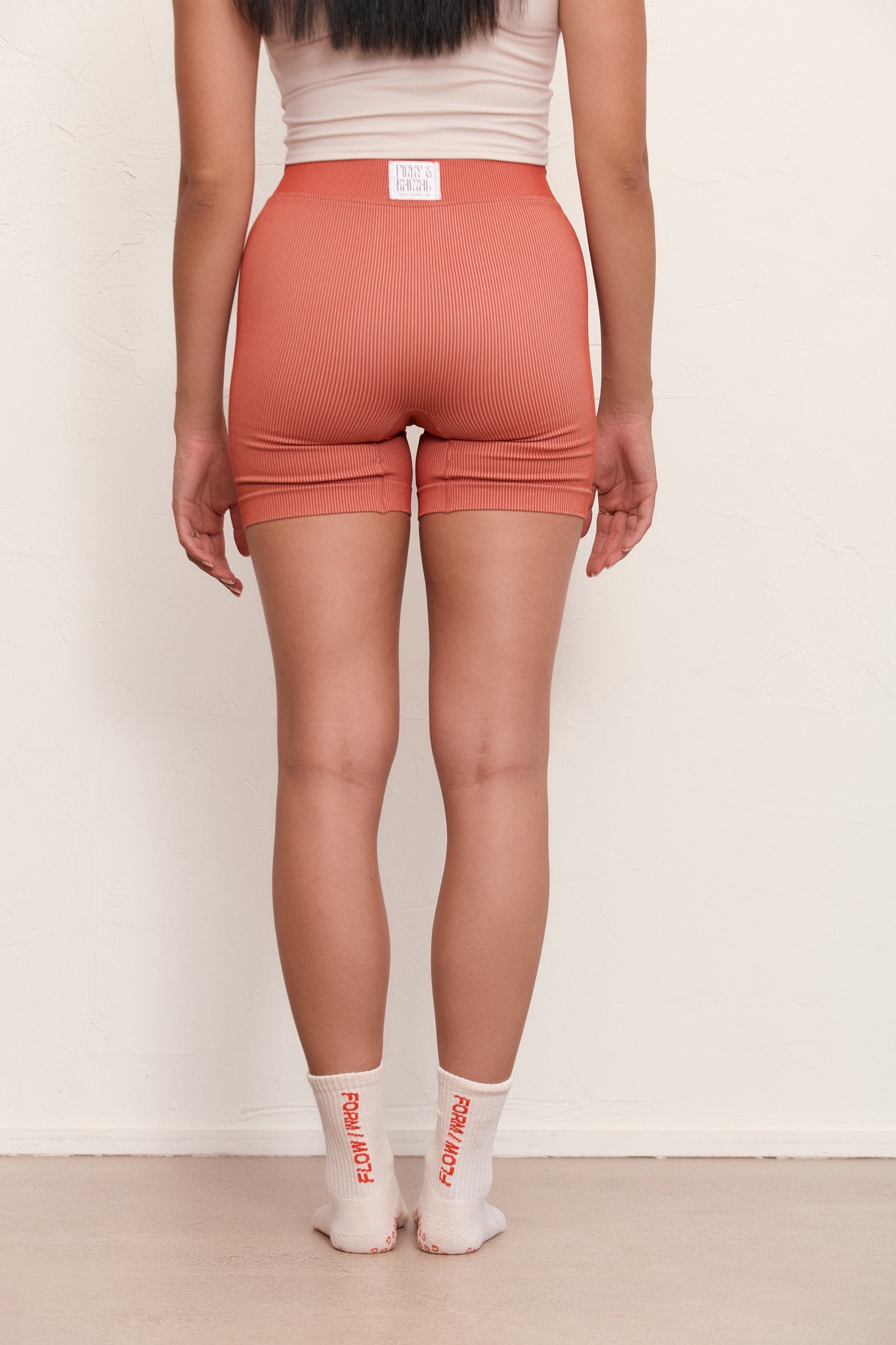 
                  
                    trendy cream and red pilates socks for everyday movement
                  
                