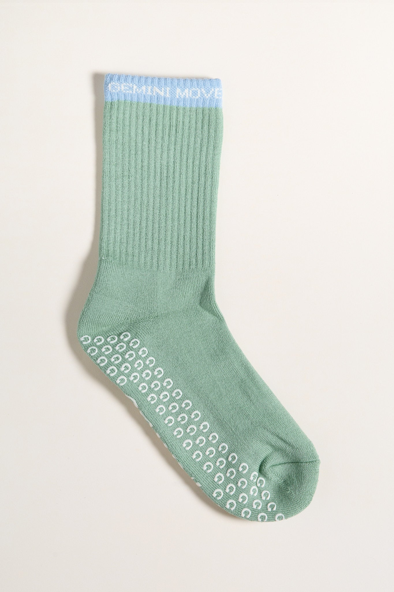 green pilates grip socks for reformer pilates and barre