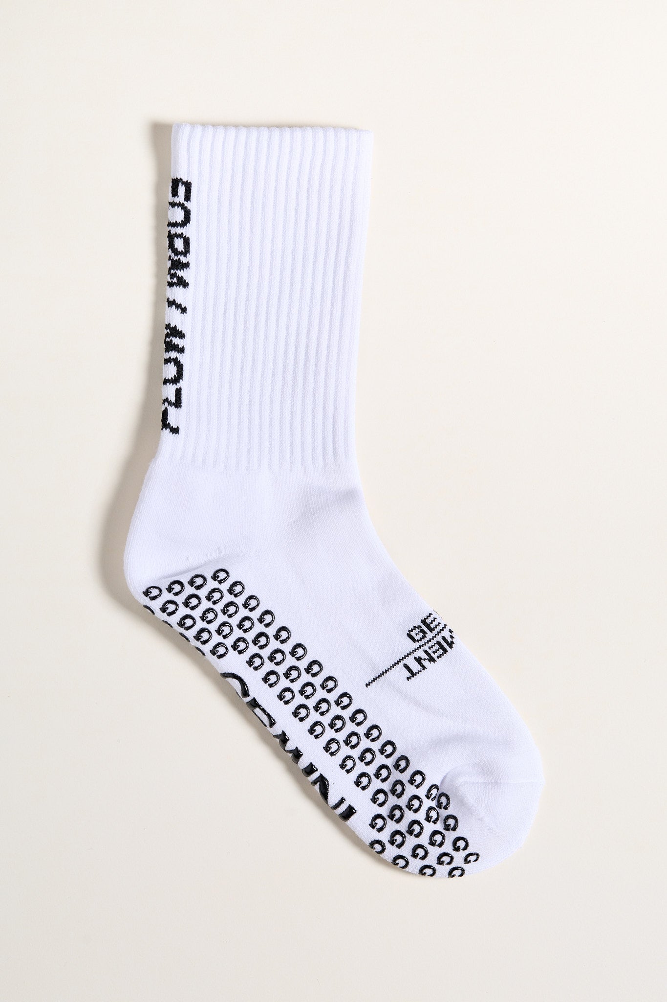 white pilates grip socks for reformer pilates and barre