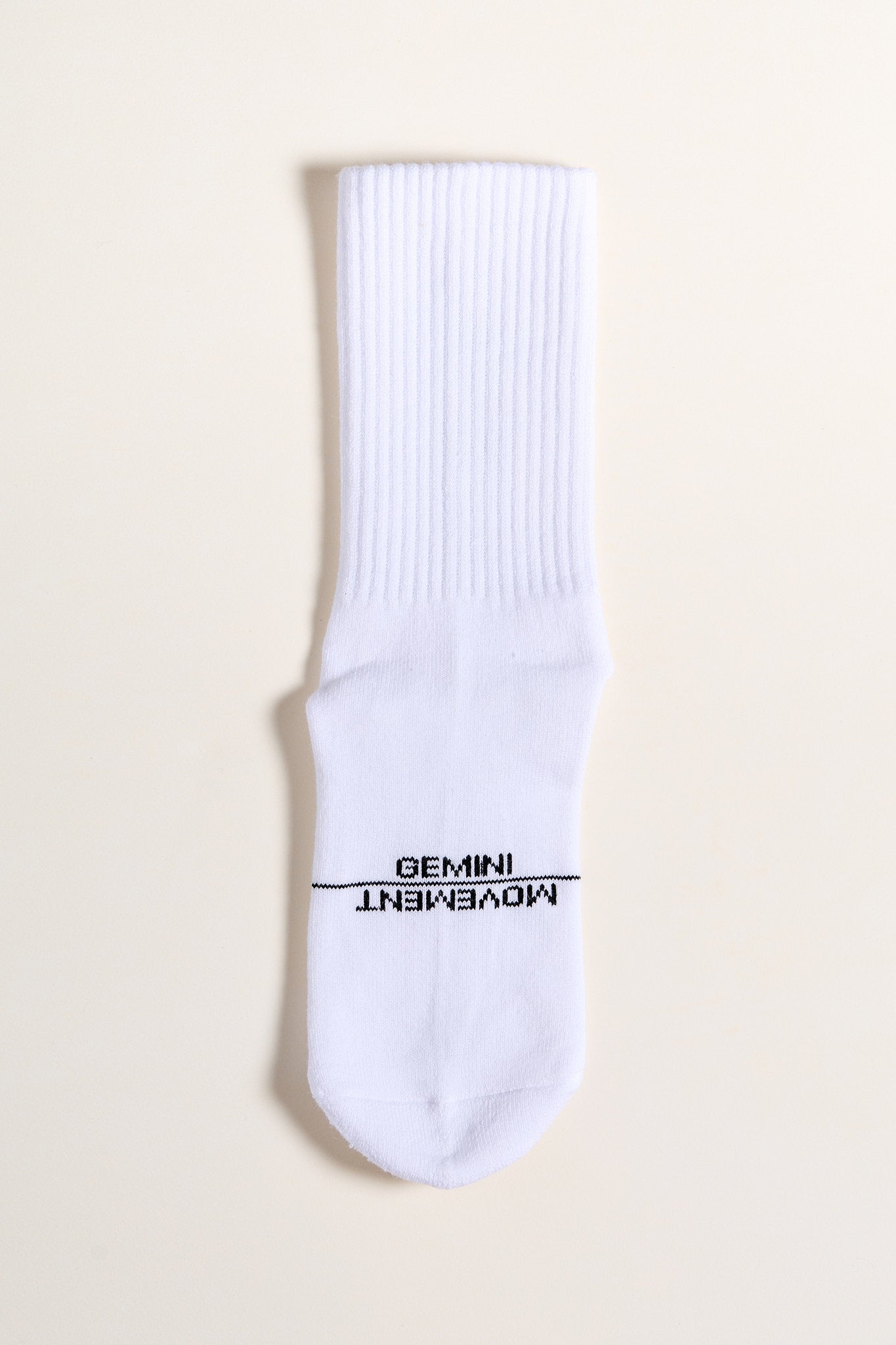 
                  
                    white crew pilates socks with black non slip grip pattern
                  
                